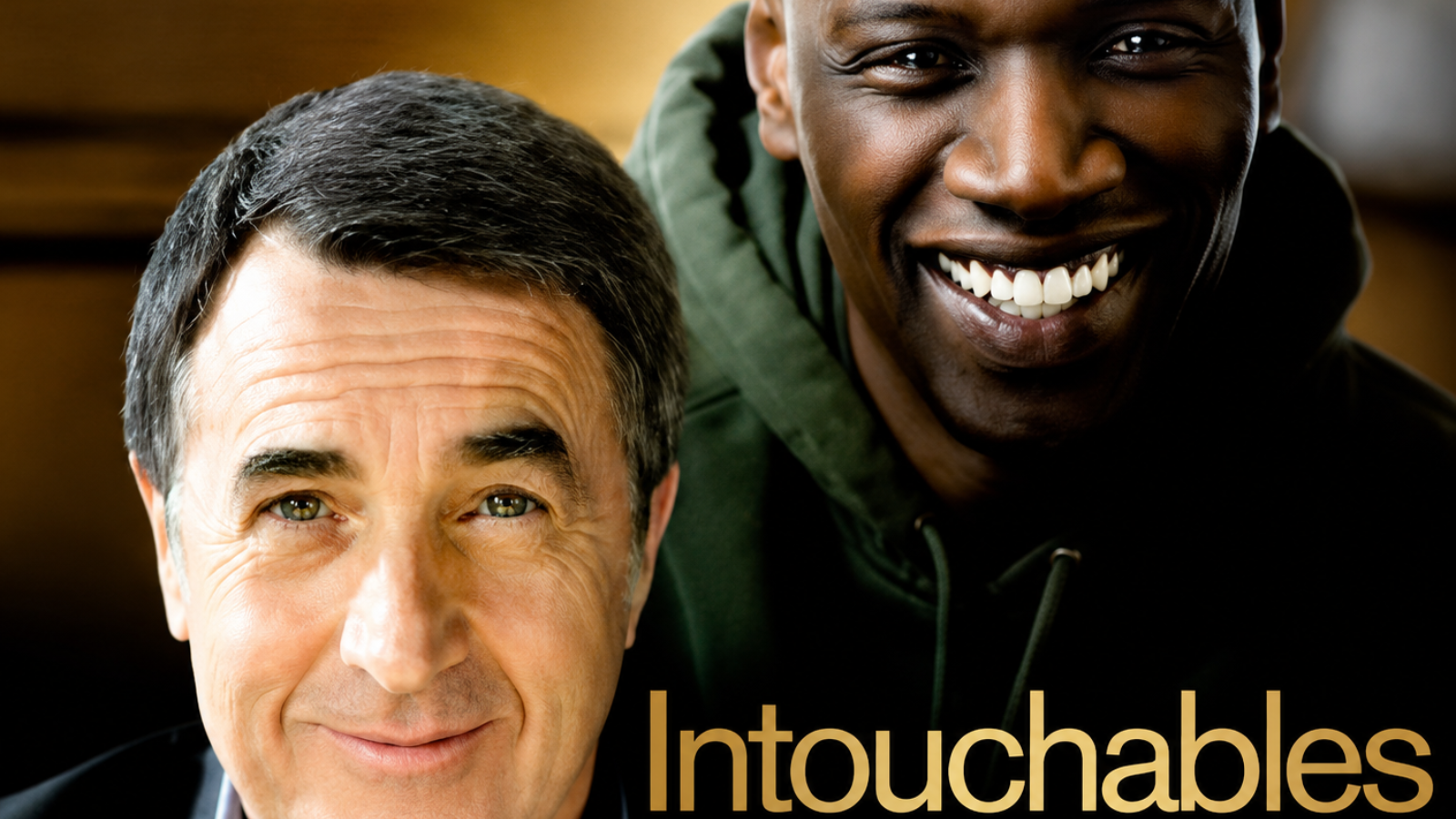 un hombre blanco y otro hombre negro y el titulo intocables