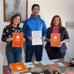 Ana Argento con el jefe comunal de comuna de Rafael García y la representante de la UNC